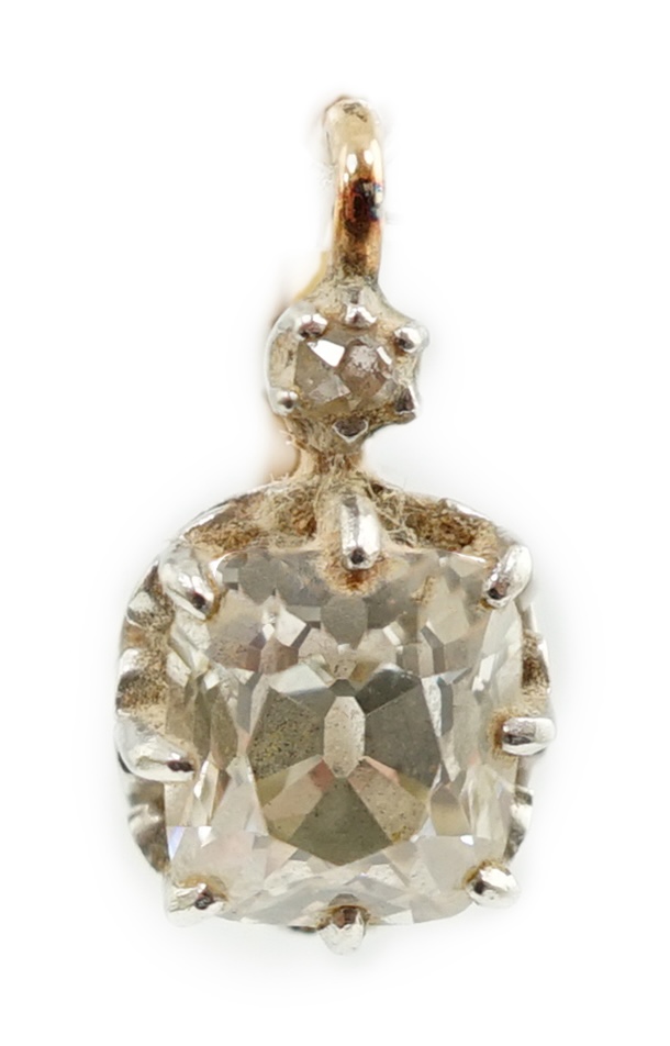 A pair of late 19th/early 20th century gold and two stone cushion cut diamond set earrings